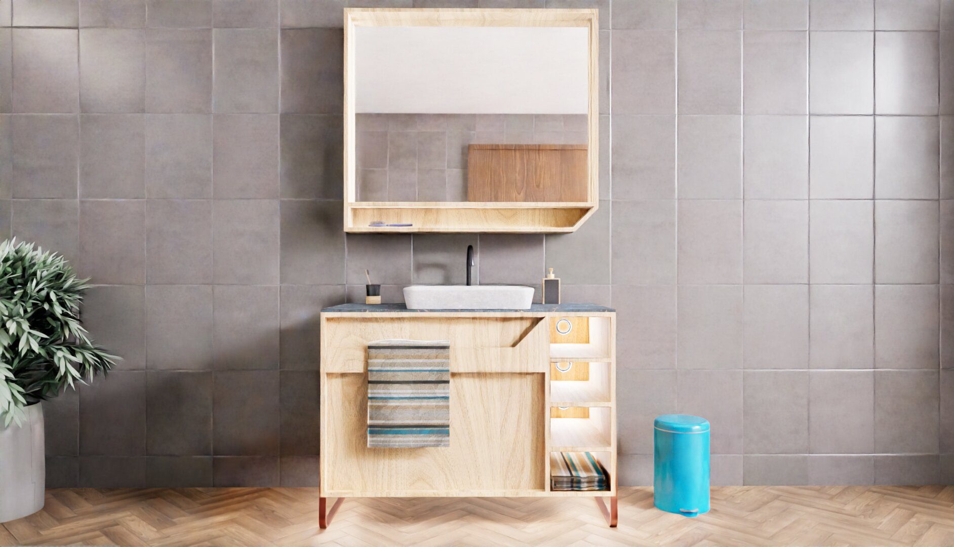 Modern bathroom with a wooden vanity, vessel sink, large mirror, towels, toiletries, a potted plant on the left, and a blue trash bin on the right against gray tiled walls.